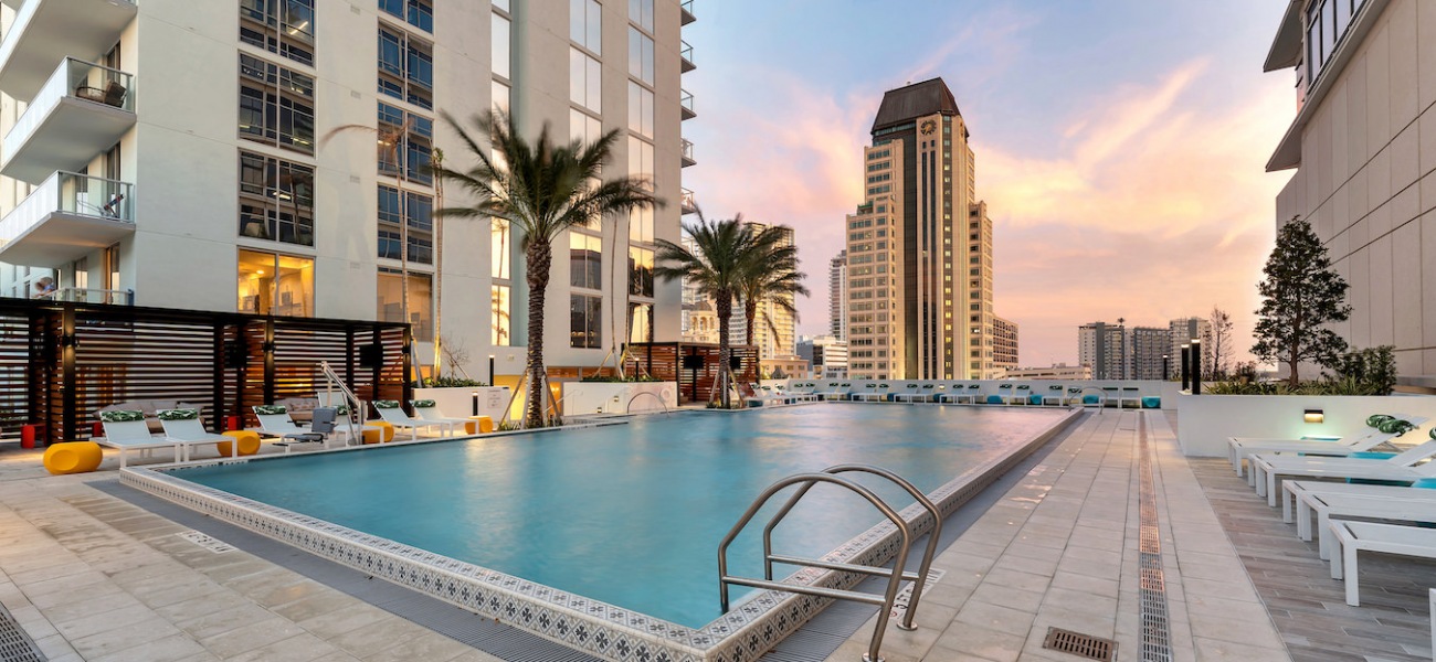 ascent st petersburg swimming pool sundeck cabanas sunset sky ascent st petersburg swimming pool sundeck cabanas sunset sky