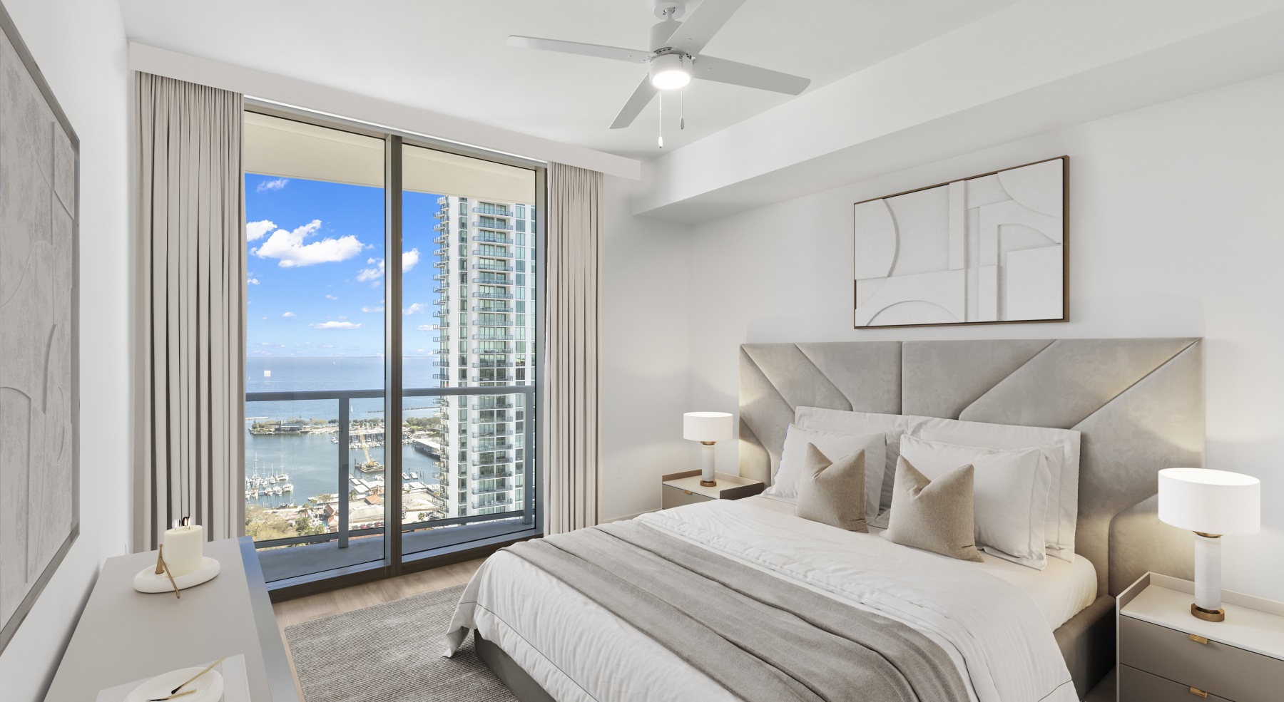 ascent st pete penthouse bedroom bed balcony doors waterfront view blue sky dresser ceiling fan ascent st pete penthouse bedroom bed balcony doors waterfront view blue sky dresser ceiling fan