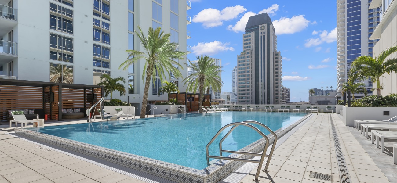 ascent st petersburg swimming pool sundeck cabanas sunset sky