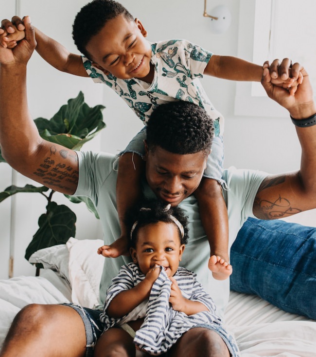 Father playing with his kids 